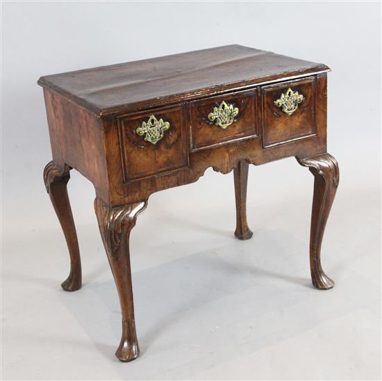 An early 18th century walnut and fruitwood lowboy, W.2ft 6in. D.1ft 7in. H.2ft 4in.